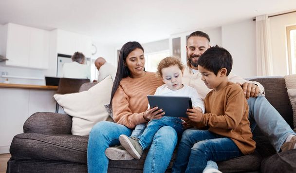 Bonding, tablet and happy with family on sofa in relax streaming and playing education games. Technology, internet and connection for parents and children browsing online at home for social media app. - Foto, Bild