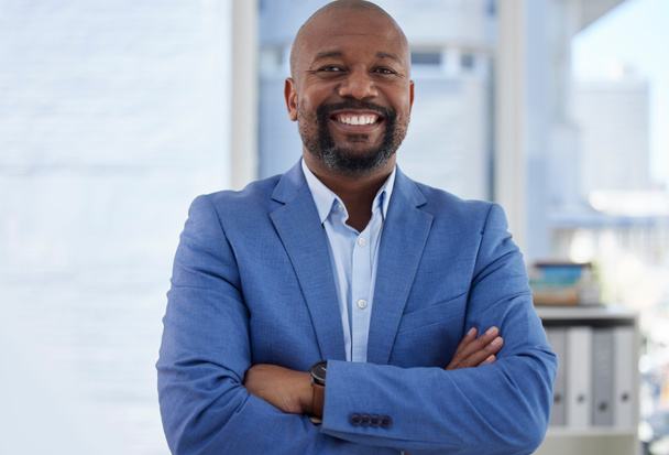 Happy black man, arms crossed or business portrait of corporate motivation in company about us or profile picture. Smile, confident or mature management person and success mindset or CEO introduction. - 写真・画像