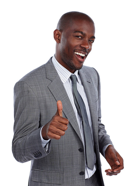 Youve got my seal of approval. Cropped portrait of a businessman giving you thumbs up against a white background - Foto, Bild