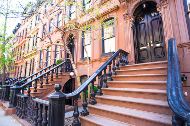 Old houses with stairs in the historic district of West Village - Photo, Image