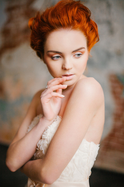Beautiful girl with red hair - Fotó, kép
