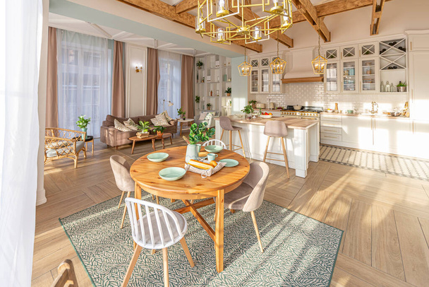 modern expensive luxurious open-plan apartment. Rich Scandinavian-style interior with wooden beams on the ceiling in pastel colors - 写真・画像