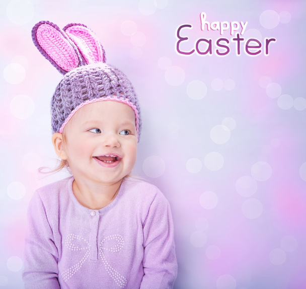 Cute baby wearing Easter bunny costume - 写真・画像