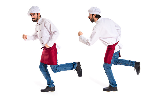 Chef corriendo rápido sobre fondo blanco
 - Foto, imagen