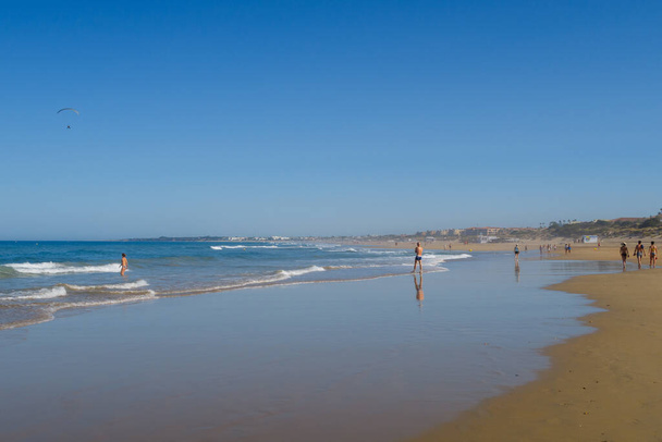 La Barrosa beach, at low tide, in Sancti Petri, Chiclana de la Frontera, Cadiz, Spain - Photo, Image