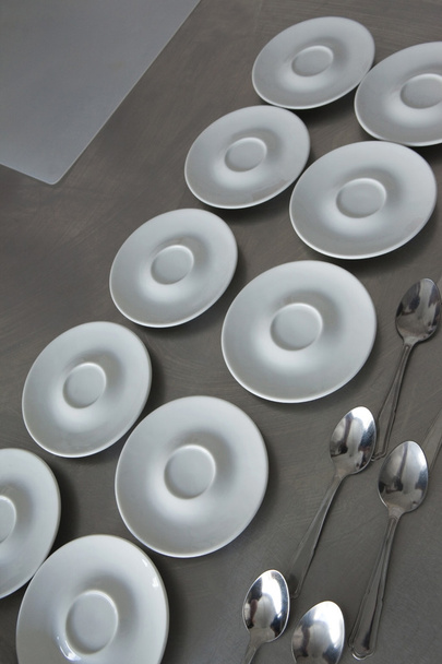 Spoons and plates - 写真・画像