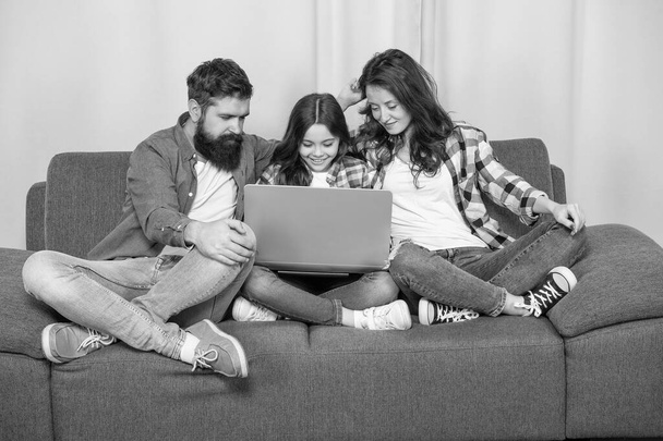 family blog. happy parents with kid girl study online. mom dad and daughter shopping on cyber monday. modern education and communication. video call. father mother and child use laptop. - 写真・画像