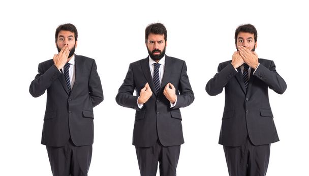 Podnikatel dělá gesto překvapení nad bílým pozadím - Fotografie, Obrázek