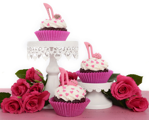 Cupcakes rosa con zapatos de tacón alto
 - Foto, imagen