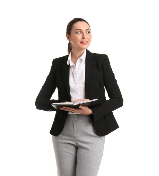 Female business consultant with notebook on white background - Fotografie, Obrázek