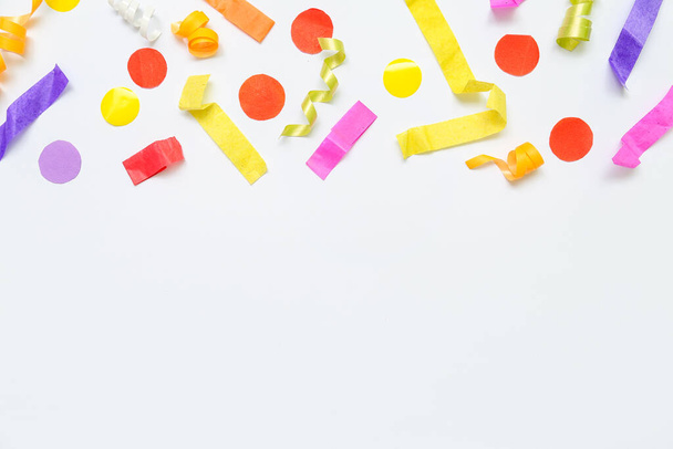 Composition with colorful confetti on white background - Foto, imagen