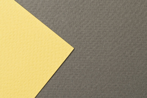 Rough kraft paper background, paper texture black yellow colors. Mockup with copy space for text - Foto, Imagen