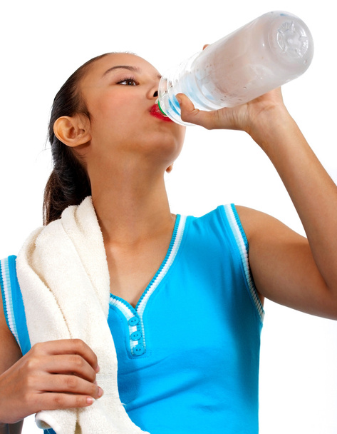 運動後水を飲んでのどが渇いている女の子 - 写真・画像