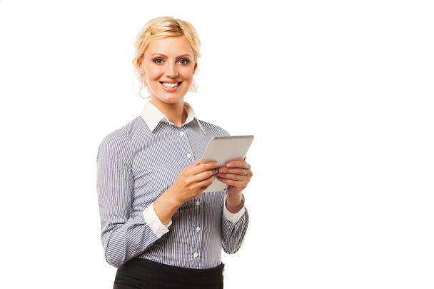 Businesswoman holding tablet computer isolated on white background. - Foto, afbeelding