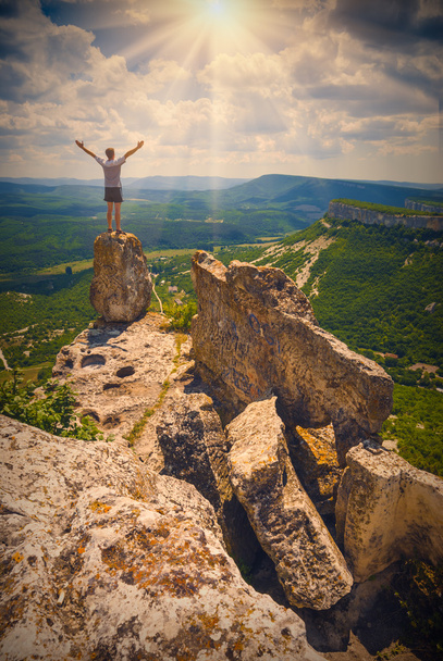 Hiker standing on mountain - Foto, imagen