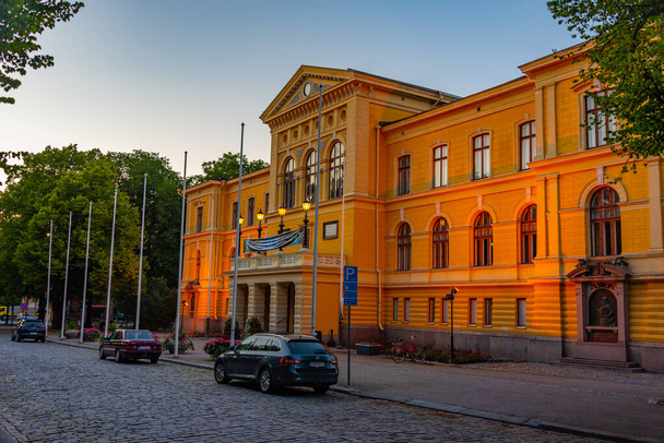 Sunset view of town hall in Finnish town Vaasa. - 写真・画像