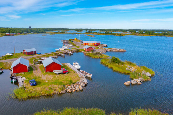 Aerial view of red timber boat houses at Svedjehamn in Finland. - Photo, Image