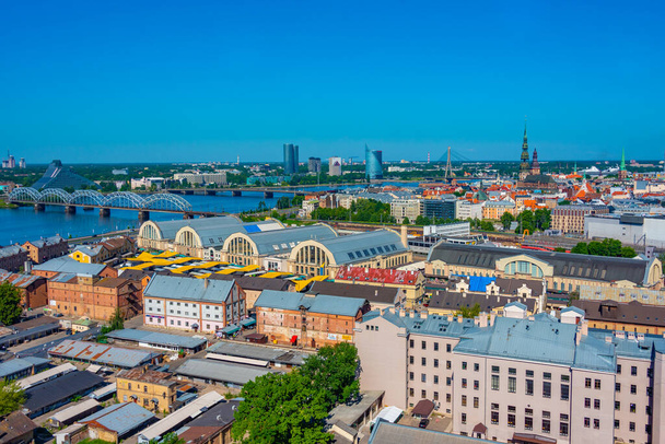 Aerial view of Riga including the Latvian national library and the zeppelin hangars from top of the academy of sciences building.. - Zdjęcie, obraz