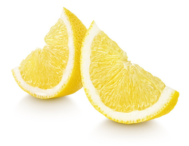 Slices of lemon citrus fruit isolated on white - Foto, afbeelding
