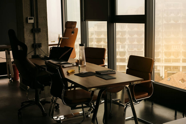 empty desks workspaces in coworking space - Photo, Image