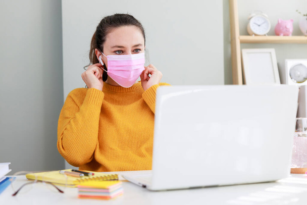 Young woman working from home after coronavirus pandemic - Fotoğraf, Görsel