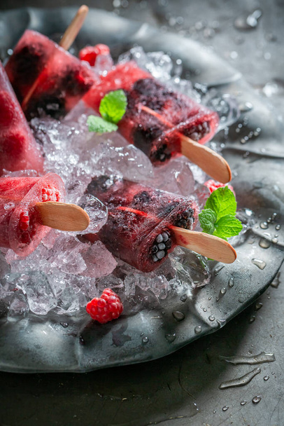Delicious and homemade berry fruits ice cream made with water. Sorbets made with water and berries. - Fotoğraf, Görsel