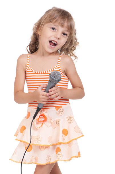 Child with microphone - Foto, imagen