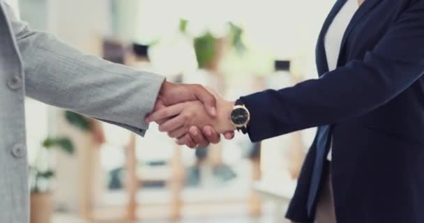 Handshake, bribery and corruption with business people in an office exchanging the payment of cash for extortion. Money, criminal and blackmail with two employees shaking hands in a deal of crime. - Video