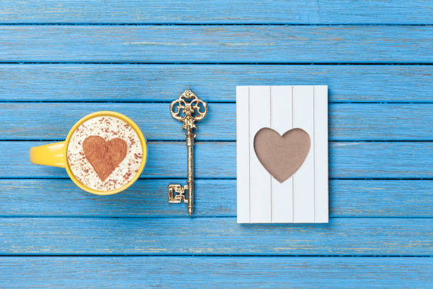 Cappuccino, key and photo frame - Photo, Image
