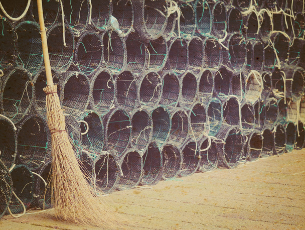 broom and fishnets in vintage tone - Photo, Image