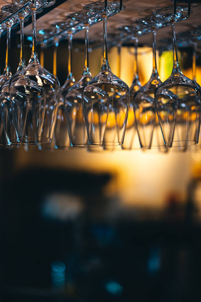 collection of alcohol wine glass upside down in restaurant - Zdjęcie, obraz