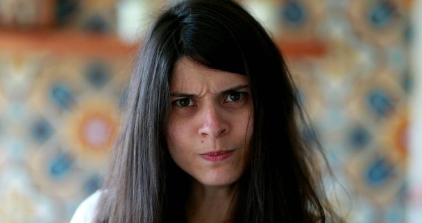 Upset woman reaction, 30 year old portrait of angry person staring at camera - Fotografie, Obrázek