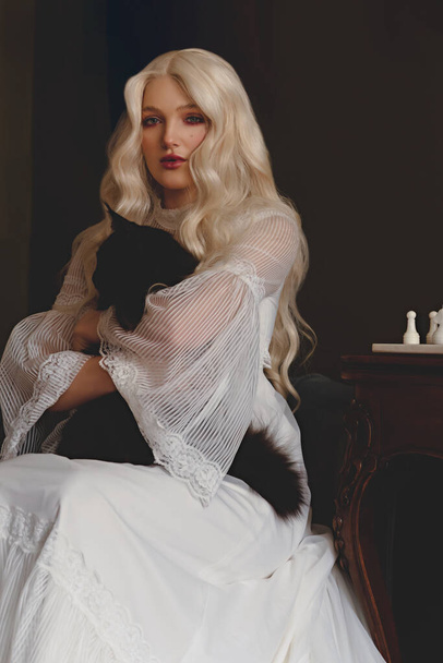 Young woman in a vintage white dress sitting in a room with a black Maine-Coon cat. - Foto, afbeelding
