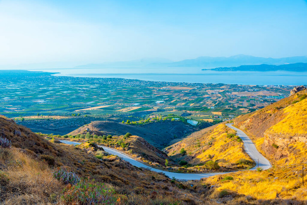 Agricultural landscape alongside Gulf of Corinth in Greece. - Fotografie, Obrázek