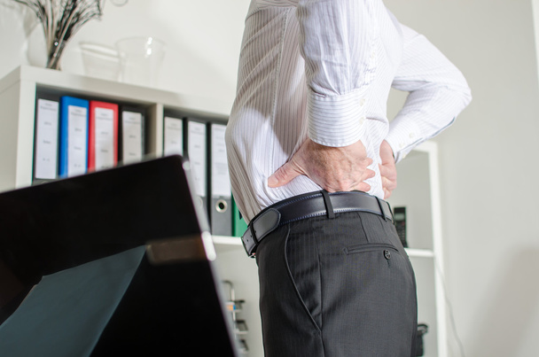 Businessman with back pain - Photo, Image