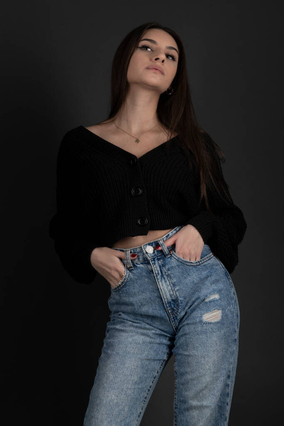 Young and beautiful teenage girl in denim jeans  - Foto, immagini