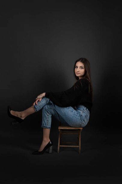 Young and beautiful teenage girl in denim jeans  - Valokuva, kuva