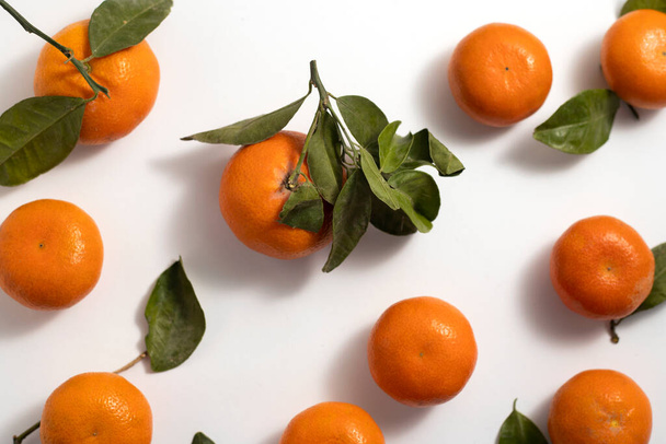 Fresh mandarine on a white background. Top view, flat lay. - Φωτογραφία, εικόνα