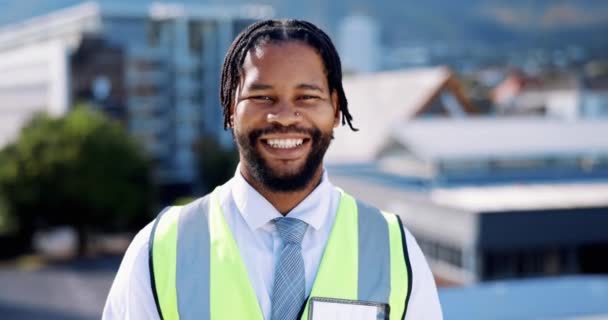 Construction, engineer and black man portrait outdoor with a smile and happy face for building industry. Engineering person or male contractor in city for development, innovation and project planning. - Footage, Video