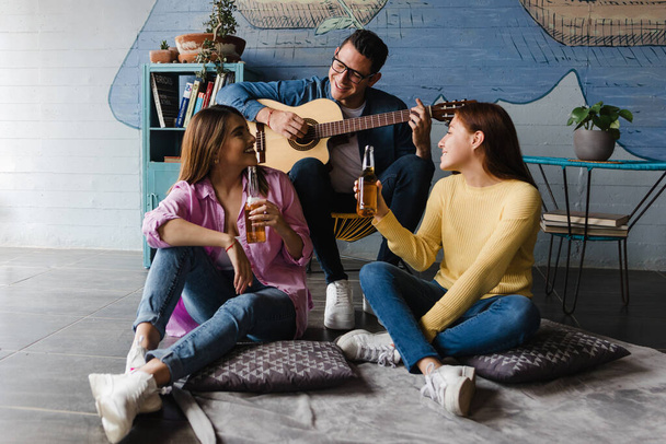 young latin friends having party and playing guitar at home in Mexico Latin America, hispanic people - Φωτογραφία, εικόνα