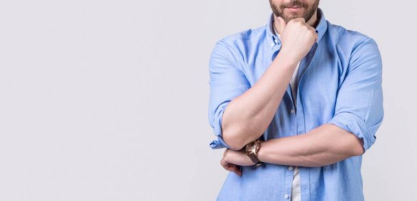 cropped photo of stylish man with stubble. stylish man with stubble wearing casual shirt. stylish man with stubble isolated on grey background. stylish man with stubble in studio. - Foto, imagen