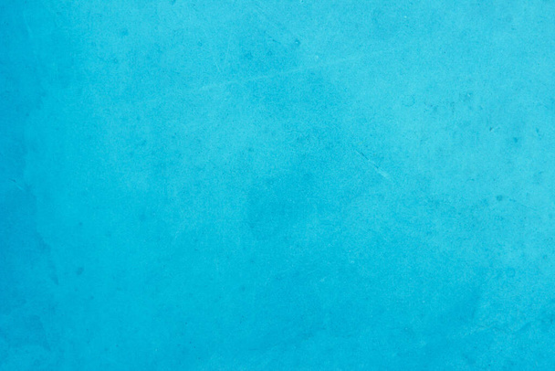 Blue dark concrete texture for background in summer wallpaper. Cement colour and sand wall of tone vintage. Abstract teal dark color. Cement grain texture paint watercolor for design decoration. - Photo, image