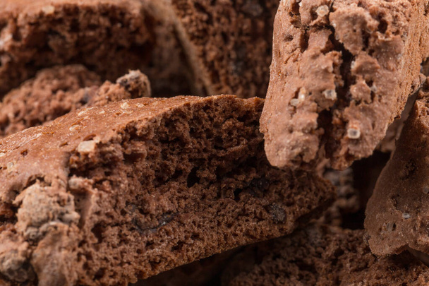 Cantucci with chocolate pieces close up as a background - Foto, afbeelding