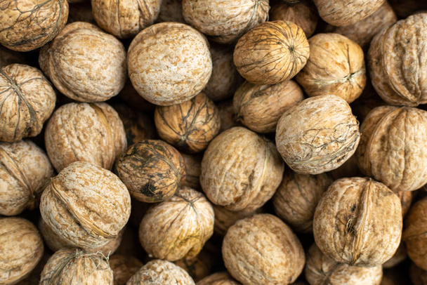 Luonnollinen saksanpähkinä tausta rakenne Abstrakti saksanpähkinöitä. Sadonkorjuu, maatalous - Valokuva, kuva