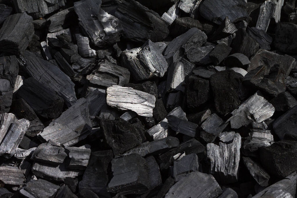 Coal mineral black as a cube stone background - Foto, afbeelding