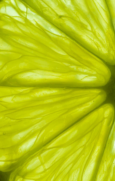 レモンスライスのクローズアップ。質素で抽象的な果実の背景。高品質の写真 - 写真・画像