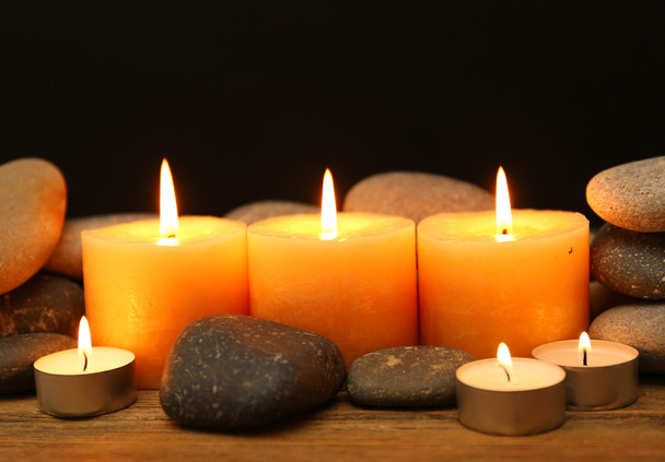 Burning candles on dark background - Foto, imagen