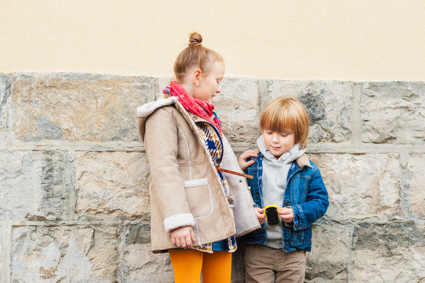 Fashion portrait of adorable kids outdoors - Фото, изображение