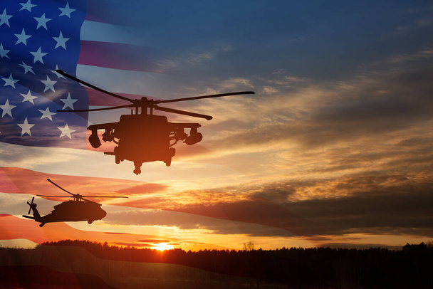 Silhouettes of helicopters on background of sunset with a transparent American flag. Greeting card for Veterans Day, Memorial Day, Air Force Day. USA celebration. - Фото, изображение