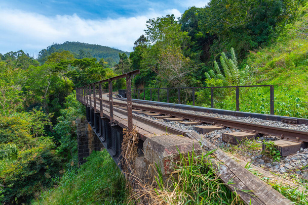 Rail track on a hillside track among tea plantations at Sri Lanka. - Фото, изображение